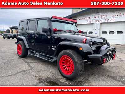 2016 Jeep Wrangler Unlimited, $20900. Photo 1