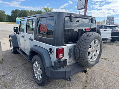 2012 Jeep Wrangler Unlimited, $7995. Photo 3
