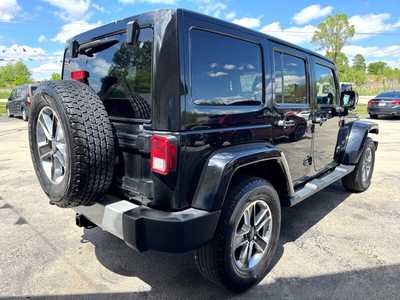 2013 Jeep Wrangler Unlimited, $13995. Photo 5