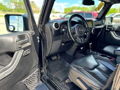 2013 Jeep Wrangler Unlimited, $13995. Photo 9