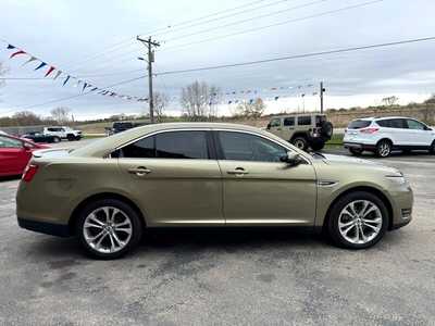 2013 Ford Taurus, $7469. Photo 4