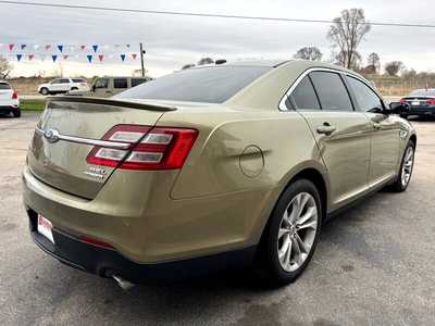 2013 Ford Taurus, $7469. Photo 5