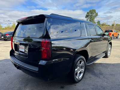 2015 Chevrolet Suburban, $12157. Photo 5