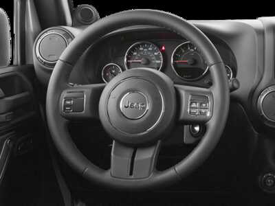 2013 Jeep Wrangler Unlimited, $12349.0. Photo 12