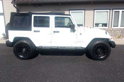 2013 Jeep Wrangler Unlimited, $12349.0. Photo 1