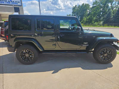 2011 Jeep Wrangler Unlimited, $17950. Photo 3