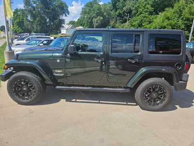 2011 Jeep Wrangler Unlimited, $17950. Photo 1