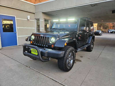 2011 Jeep Wrangler Unlimited, $10750. Photo 1