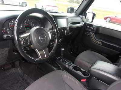 2018 Jeep Wrangler, $17750. Photo 11