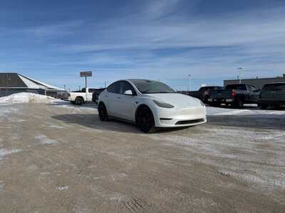 2023 Tesla Model Y, $32990. Photo 1