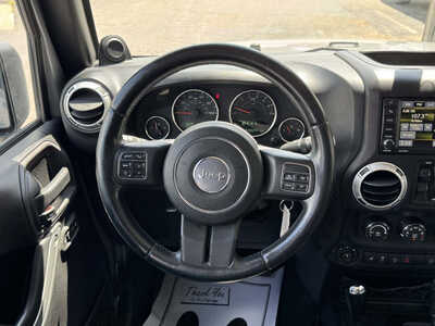 2013 Jeep Wrangler Unlimited, $17169. Photo 9