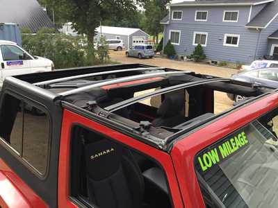 2014 Jeep Wrangler, $15998. Photo 1