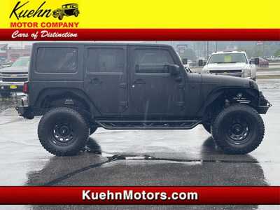2012 Jeep Wrangler Unlimited, $16900. Photo 1