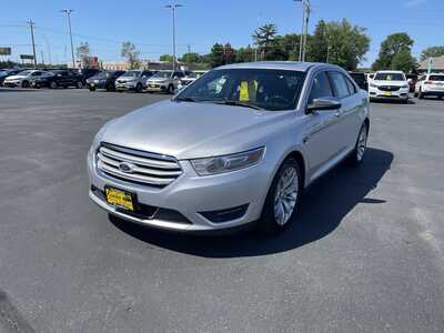 2014 Ford Taurus, $7347. Photo 4