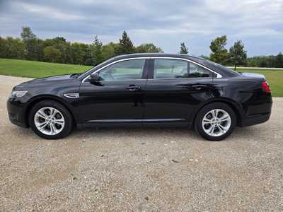 2016 Ford Taurus, $9895. Photo 1