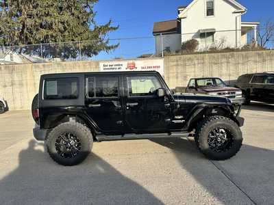 2012 Jeep Wrangler Unlimited, $13900. Photo 1