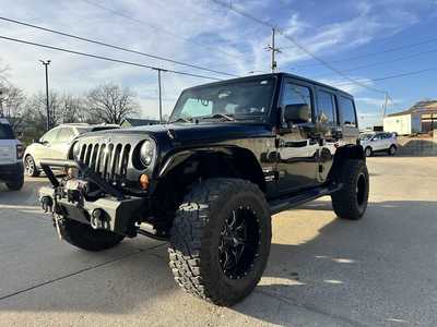 2012 Jeep Wrangler Unlimited, $13900. Photo 6