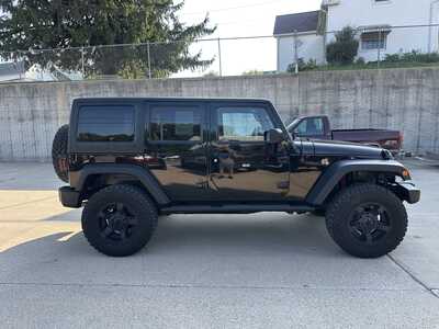 2014 Jeep Wrangler Unlimited, $14900. Photo 1