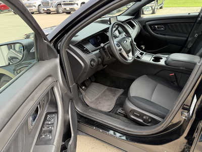 2013 Ford Taurus, $7974. Photo 5