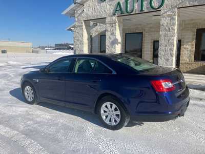 2011 Ford Taurus, $6495. Photo 4