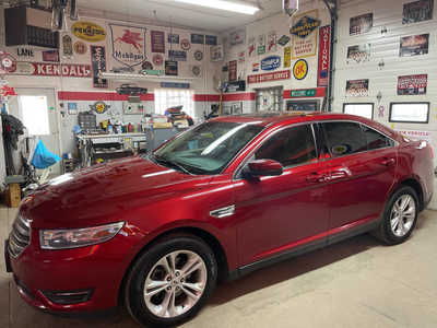 2014 Ford Taurus, $8995. Photo 4