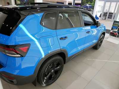 2025 Volkswagen Taos, $33356. Photo 7