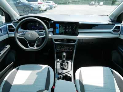 2025 Volkswagen Taos, $31178. Photo 7