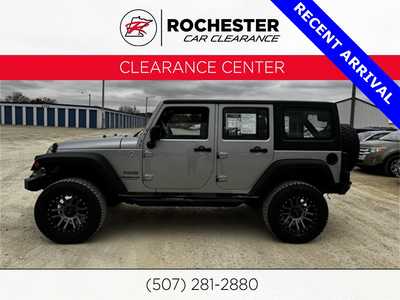 2013 Jeep Wrangler Unlimited, $16197. Photo 1