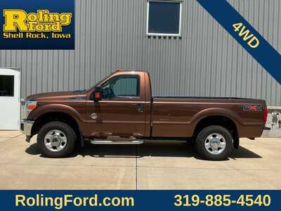 2011 Ford F250 Reg Cab, $27574. Photo 2