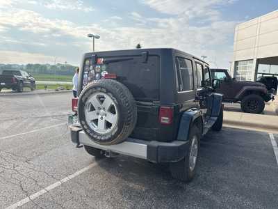 2012 Jeep Wrangler Unlimited, $10000. Photo 4
