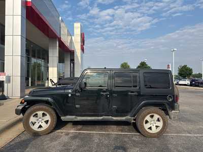 2012 Jeep Wrangler Unlimited, $10000. Photo 6