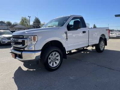 2021 Ford F250 Reg Cab, $35541. Photo 1