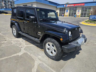 2012 Jeep Wrangler Unlimited, $14999. Photo 1