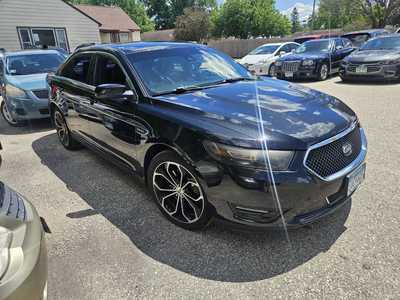 2015 Ford Taurus, $9999. Photo 2