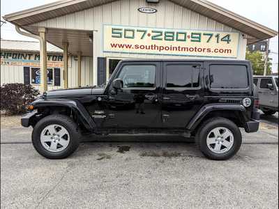 2011 Jeep Wrangler Unlimited, $14900. Photo 1