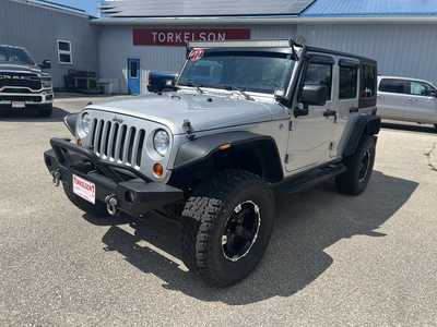 2010 Jeep Wrangler Unlimited, $12975. Photo 1