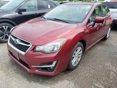 2016 Subaru Impreza, $10990. Photo 1