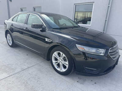 2014 Ford Taurus, $12990. Photo 1
